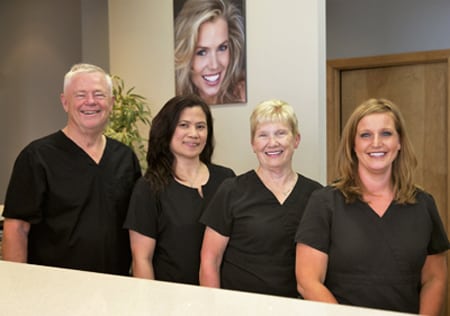 Photo of Dr. William Becker and the staff at Poplar Crossing Dental in Hoffman Estates.