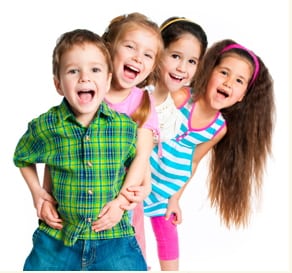 Four children lined up smiling
