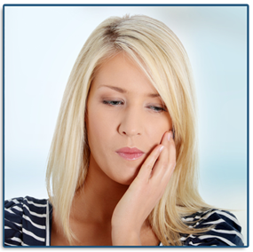 Woman grabbing her jaw with her hand